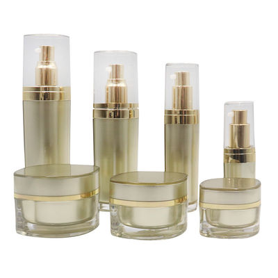 Ensemble d'emballages cosmétiques estampillés à chaud avec pompe à capuche Pc308 couverture transparente glacée Cap acrylique